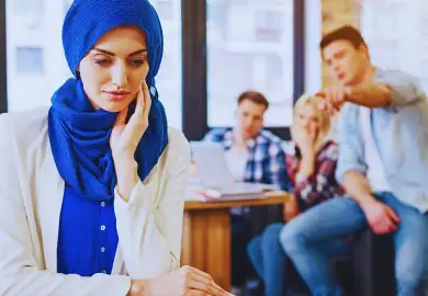 Muslim woman being bullied by her office mates.