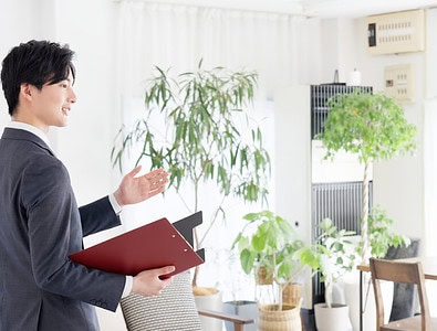 Businessman giving a tour of real estate
