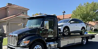 Electric vehicle flatbed towing in Peoria, AZ