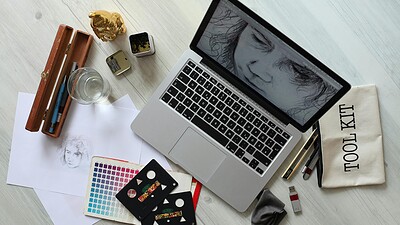 laptop and other accessories on table