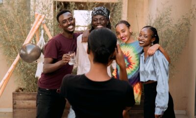 friends getting their group photo taken