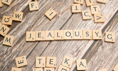 scrabble blocks forming jealousy word