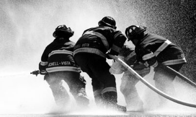 grayscale photo of firemen