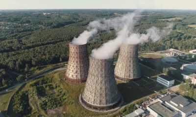 aerial view on the working power station cooling tower of nuclear power plant coal bur SBI 349994502
