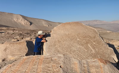 A late afternoon visit to the extensive Toro Muerto petroglyphs is a great thing to blend into your wine tour