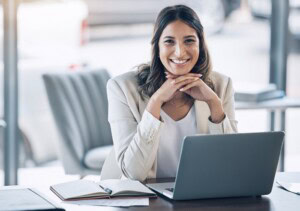 Legal consultant at desk with computer