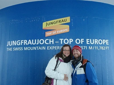 mary and josh in front of sign 300