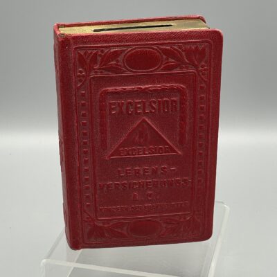 EXCELSIOR Lebensversicherungs AG - Seltene, schwere Spardose in Buchform, Metall u. Leder, um 1926/33