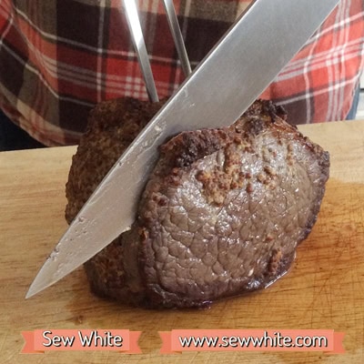 Really Easy Roast Beef being sliced once cooked