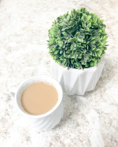 cup of organic coffee with creamer