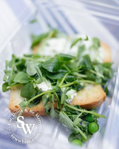 toasted bread with cream cheese and fresh pea shoots