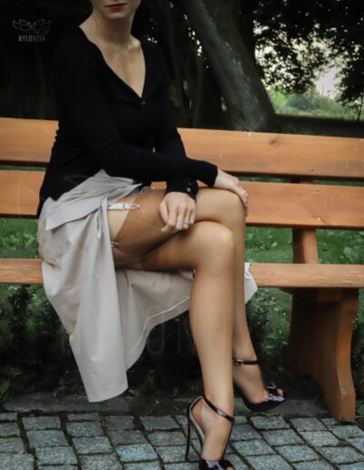 Mrs NyloNova wearing open front na-kd skirt, old vintage nylon ff stockings and Only Maker high heeled sandals.