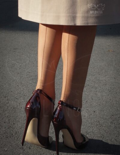 Mrs NyloNova wearing open front na-kd skirt, old vintage nylon ff stockings and Only Maker high heeled sandals.