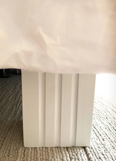 After image closeup of a cottage white bedboot installed.
