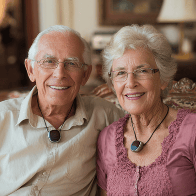 senior couple with wearable emergency response pendant