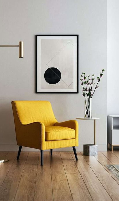 Yellow armchair in modern minimalist living room Yellow armchair in modern minimalist living room