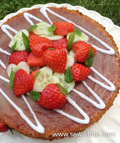 Pimm's Cake from above covered with heart shaped strawberries