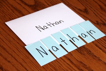 Sample student name puzzle. The child's name was written on a strip o paper, then cut about letter by letter for the child to put together.
