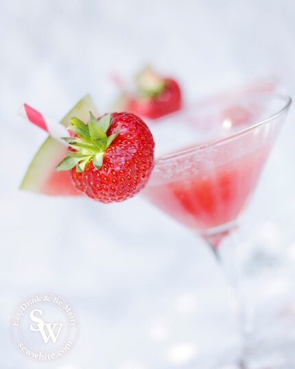 watermelon slice and strawberry on a martini glass