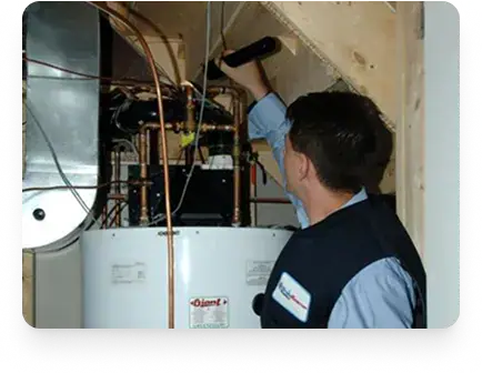 Utility room in Etobicoke where a Drain Rescue expert is working on water heater copper pipes