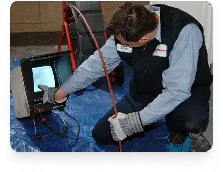 Monitoring a drain camera video screen during an Etobicoke plumbing inspection by Drain Rescue