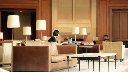 A Midtown Raleigh hotel lobby with modern minimalist decor.