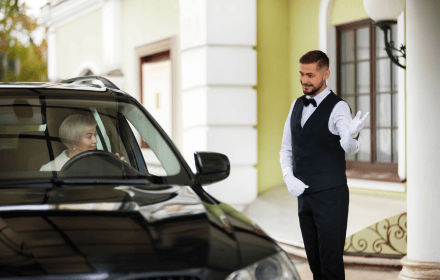 Private safe driver waiting outside Dubai hotel for client