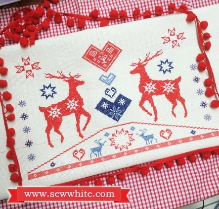 Sew White reindeer Christmas cross stitch pompom cushion 1