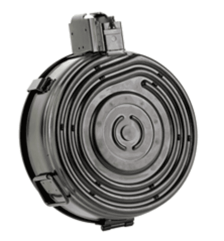Large round metal flywheel with concentric grooves and a sensor housing mounted on top.
