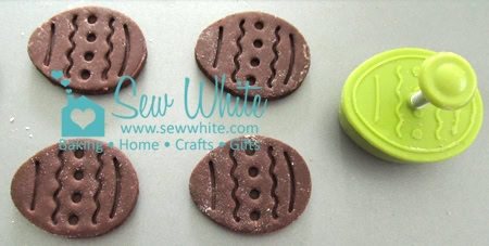 Chocolate Bourbon Biscuits cut and stamped with an Easter egg cutter