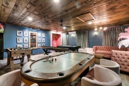 A one-of-a-kind Dolly Parton game room, built for poker, foosball, and hours of entertainment.