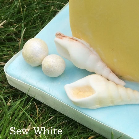 sugar paste shells for a beach cake