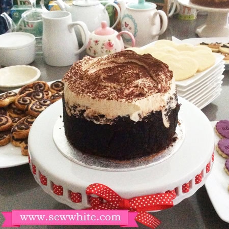 Guinness chocolate cake with cream decoration for the Battersea Dogs and Cats Home Afternoon Tea Party