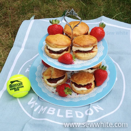 scones on a tiered stand on a Wimbledon tennis tea towel