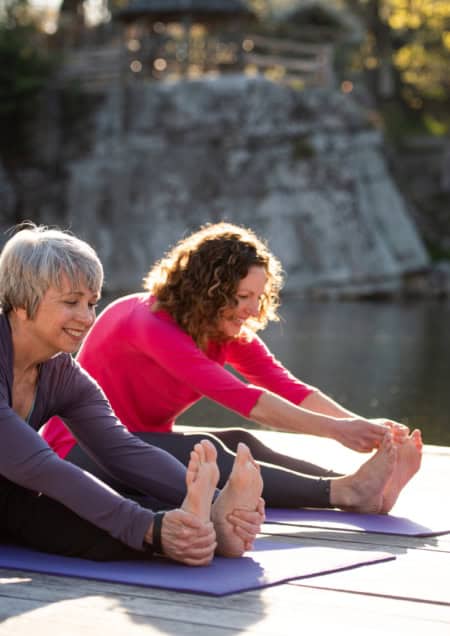 Women Practicing Yoga Outdoors at Mohonk During a Mindfulness Spa Retreat