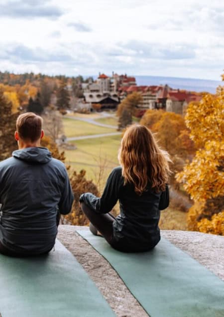 Couple Practicing Mindfulness During a Romantic Getaway to Mohonk in the Fall
