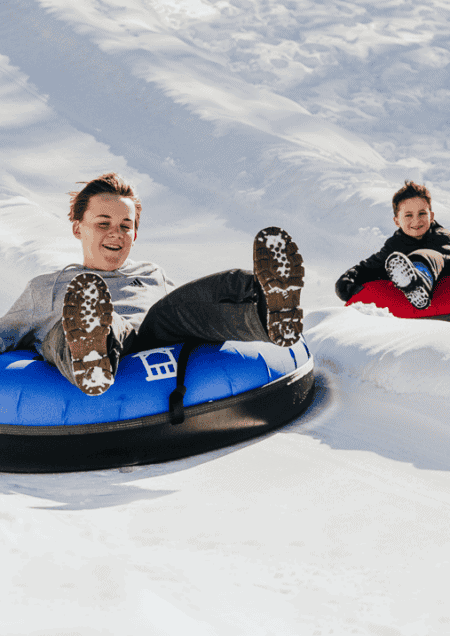 Boys Snow Tubing at Our Kid-Friendly Resort in New York