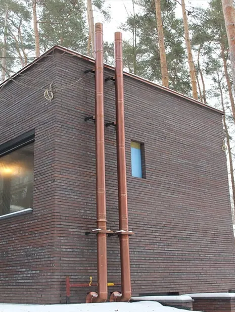 Nerezový komín opláštění z mědi