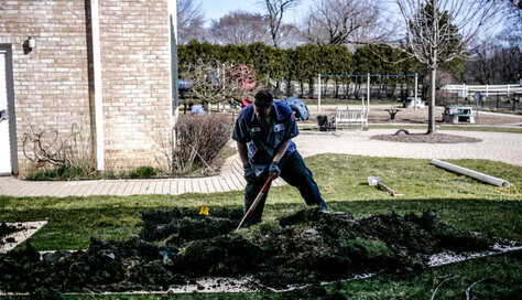 The Scottish Plumber digging broken sewer