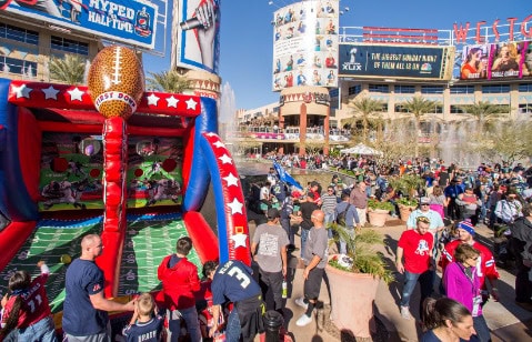Inflatable football toss game for corporate events, festivals, and private parties in Los Angeles. P.