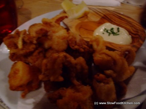 Crisp-fried baby squid with alioli and lemon