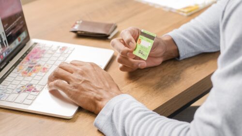 An employee falling for a Gmail phishing scam and providing their credit card details.