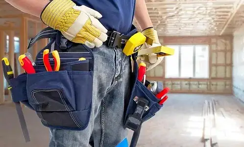 Handyman helping a homeowner safely