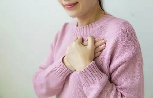Hand on chest. No breathing