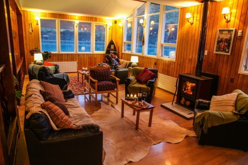 Cosy and warm by the chimney at Hosteria Pehoe