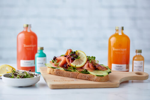 A spread of Raleigh restaurant Toastique's fresh pressed juices and gourmet toasts