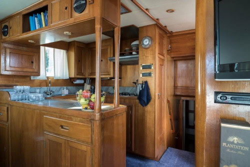 Luxury private boat tour in Opatija – guests on board a spacious motor yacht