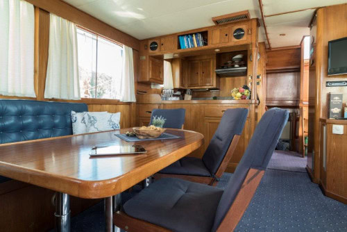 Luxury private boat tour in Opatija – guests on board a spacious motor yacht