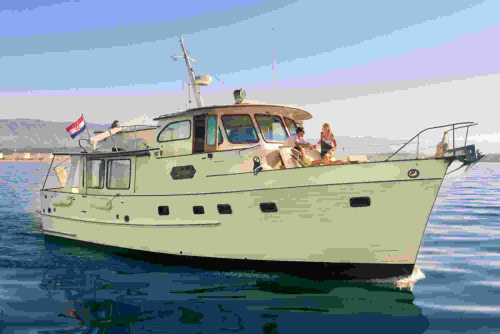 Luxury private boat tour in Opatija – guests on board a spacious motor yacht