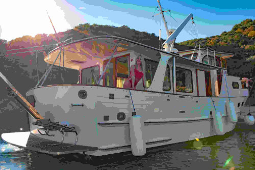 Luxury private boat tour in Opatija – guests on board a spacious motor yacht